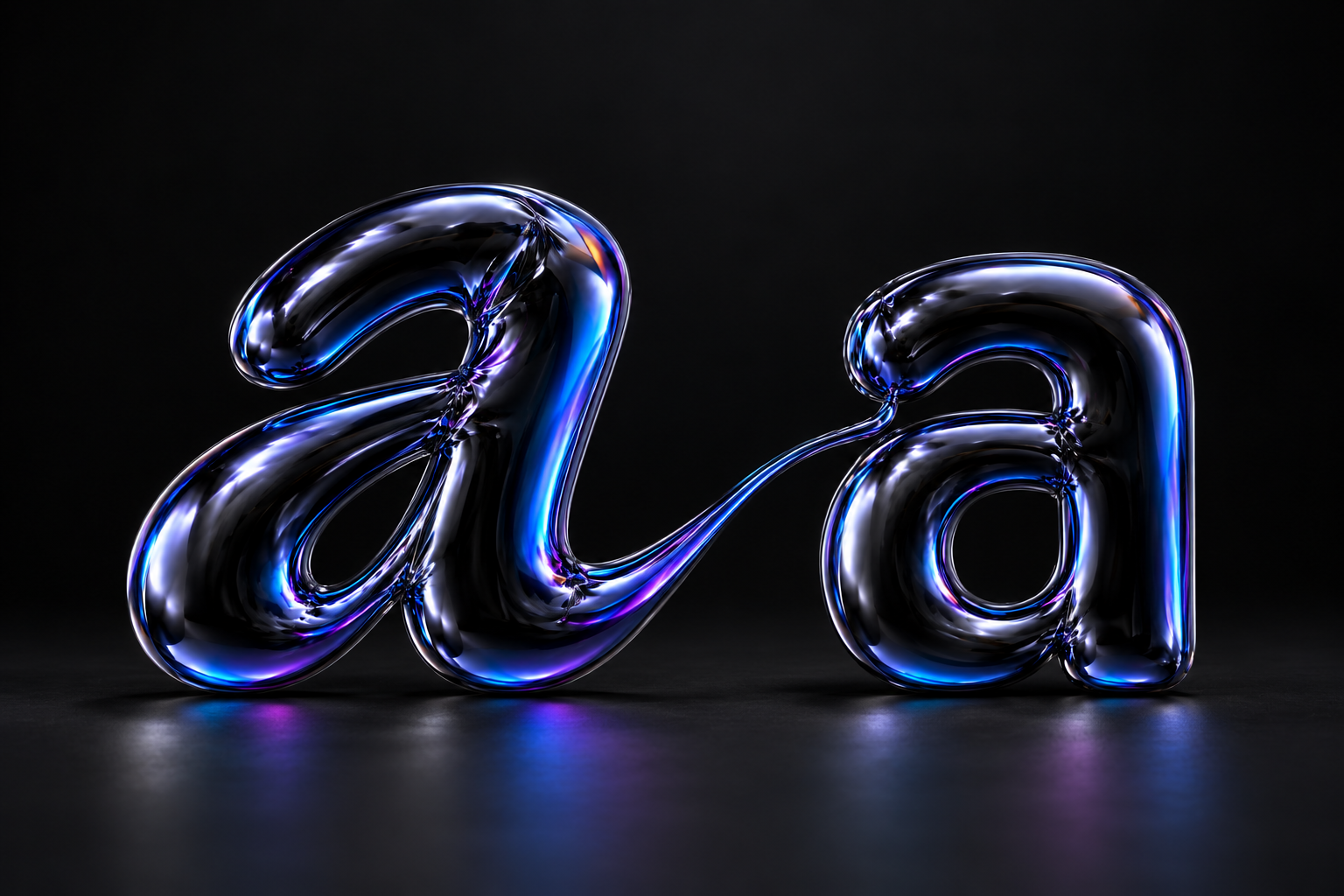 A slanted and an upright letter a made from glossy black balloon foil, joined by a fine ribbon with blue and violet reflections.