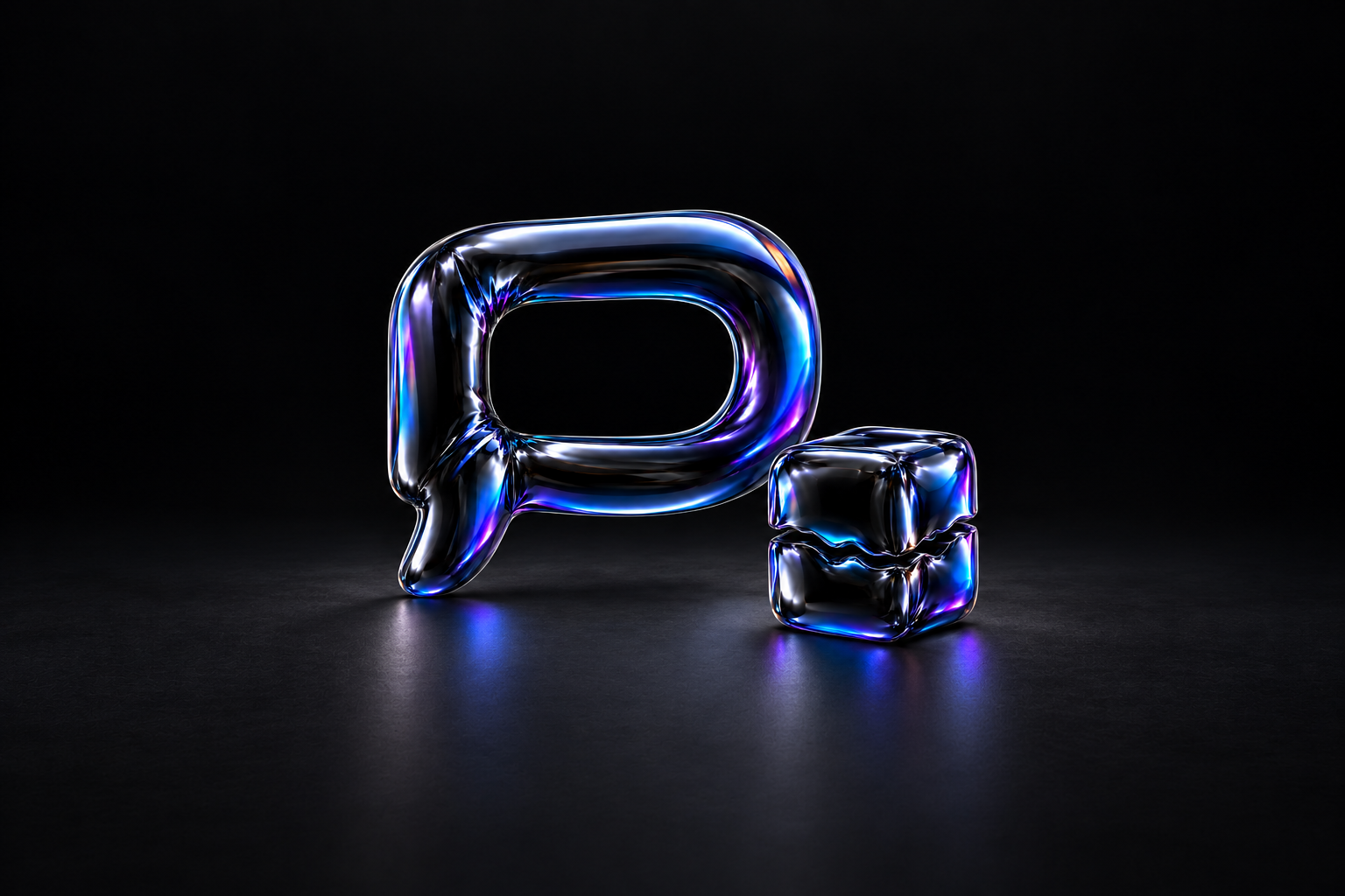 A glossy black balloon-foil speech bubble stands beside a split cube, with blue and violet reflections.