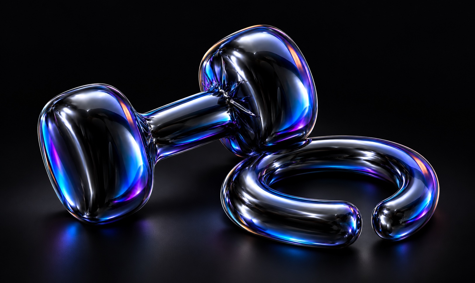 An iridescent balloon dumbbell sits beside an interval ring.
